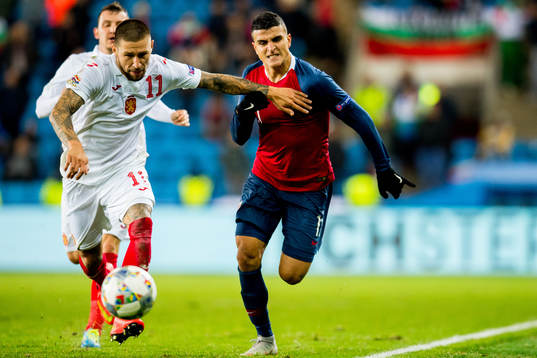 Ivan Bandalovski of Bulgaria and Mohamed Elyounoussi of