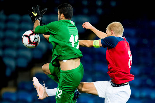 Goalkeeper Kamran Ibrahimov of Azerbaijan and Morten