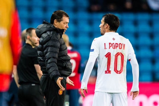 Petar Houbchev, head coach of Bulgaria,  and Ivelin Popov