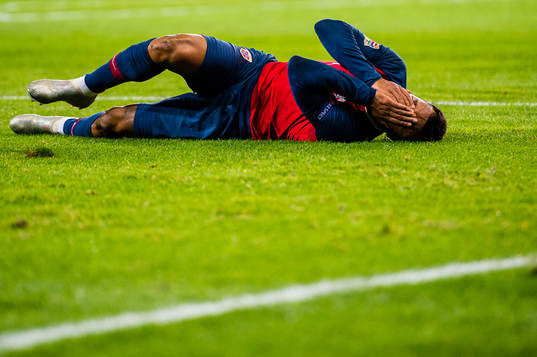 Joshua King of Norway looks dejected
