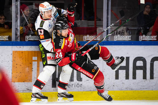 Malmö Redhawks Fredrik Händemark och Luleås Johan Harju