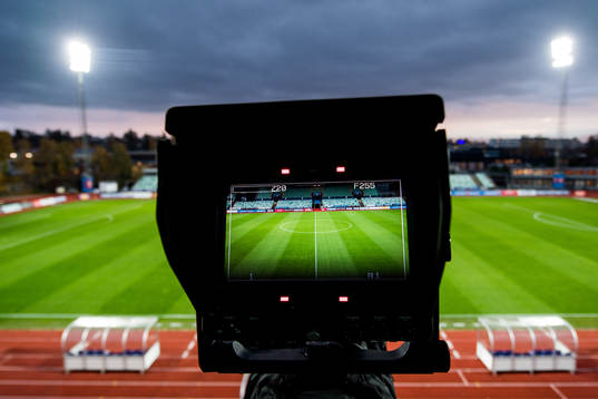 A TV camera viewfinder with a general interior view of