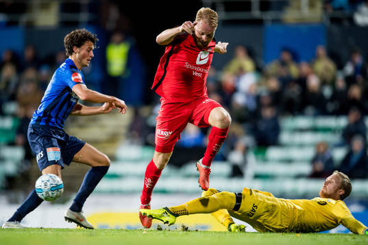 Henrik Kjelsrud Johansen of Brann and goalkeeper Robert