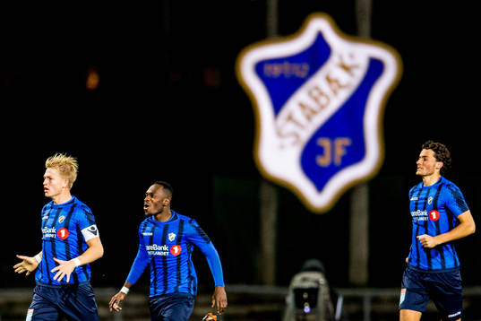 Franck Boli of Stabæk celebrates with teammates Andreas
