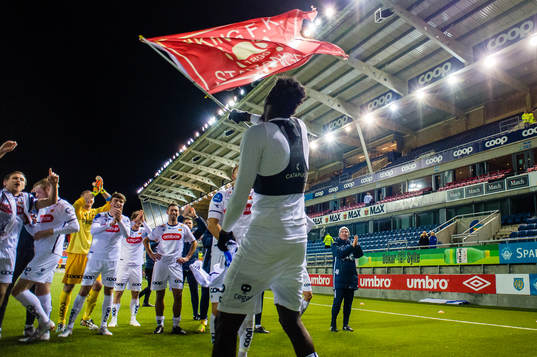 Usman Sani Sale Hassan celebrates