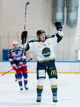 Philip Anthony Lane of Stavanger Oilers celebrates