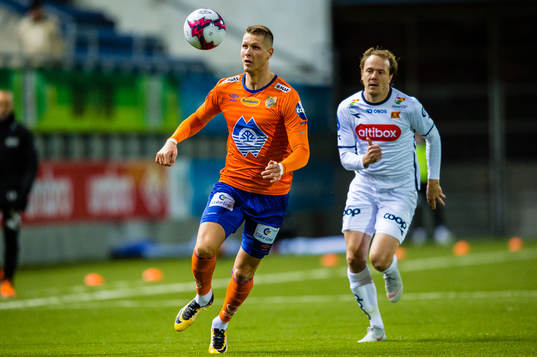 Holmbert Aron Briem Fridjonsson of Aalesund and Rolf Daniel