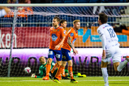 Oddbjørn Lie and Fredrik Carlsen of Aalesund looks dejected