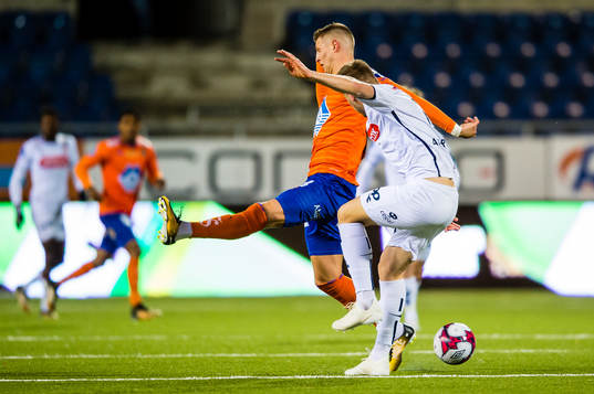 Holmbert Aron Briem Fridjonsson of Aalesund and Axel Oskar