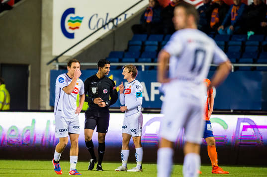 Mohammad Usman Aslam, referee,  and André Saltvold