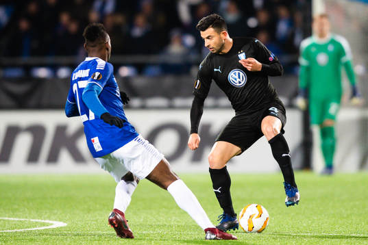 Behrang Safari of Malmö FF and Rashad Muhammed of