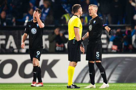 Sören Rieks of Malmö FF speaks with referee Pawel