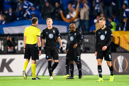 Sören Rieks of Malmö FF talks to the referee Pawel
