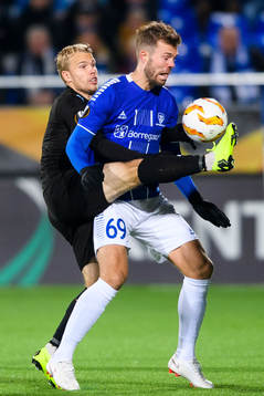 Oscar Lewicki of Malmö FF in action with Patrick Mortensen