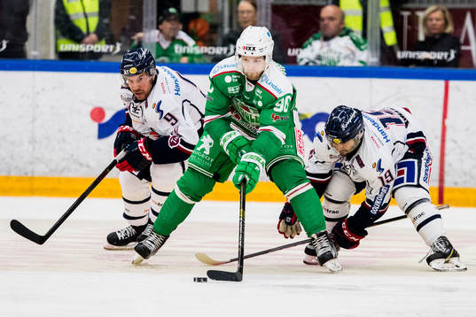 Rögles Ted Brithén och Linköpings Derek Roy och