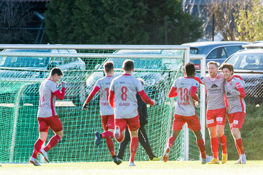 Anders Dieserud of Strømmen celebrates with teammates