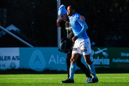 Erixon Danso of Sandnes Ulf leaves the pitch injured