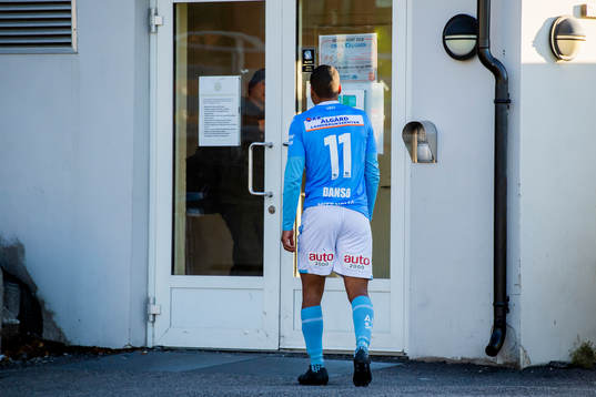 Erixon Danso of Sandnes Ulf walks off the pitch with an