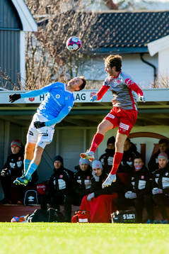 Vidar Nisja of Sandnes Ulf and Anders Dieserud of Strømmen