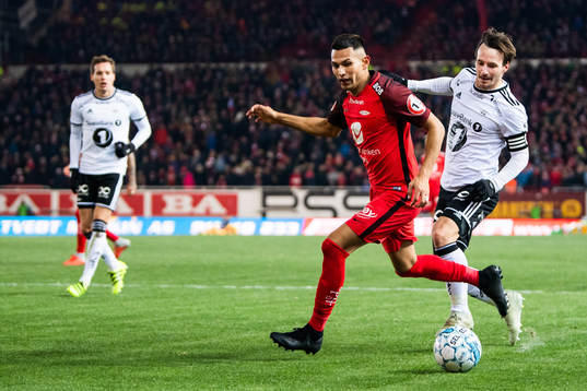 Deyver Vega of Brann and Mike Jensen of Rosenborg competes