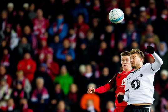 Christian Rismark of Brann and Nicklas Bendtner of Rosenborg
