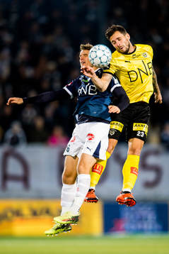 Lars Vilsvik of Strømsgodset and Daniel Alexander Pedersen