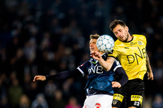 Lars Vilsvik of Strømsgodset and Daniel Alexander Pedersen