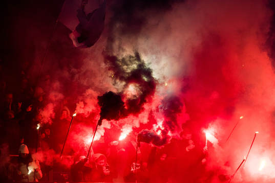 Supporters of Strømsgodset with pyro effects