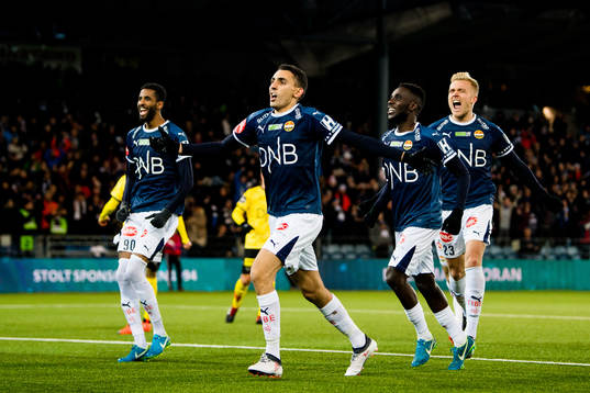 Mustafa "Mos" Abdellaoue of Strømsgodset celebrates with