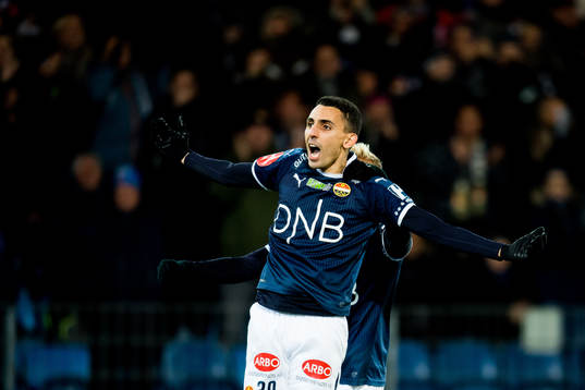 Mustafa "Mos" Abdellaoue of Strømsgodset celebrates
