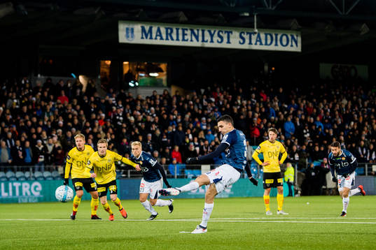 Mustafa "Mos" Abdellaoue of Strømsgodset scores the 2-0