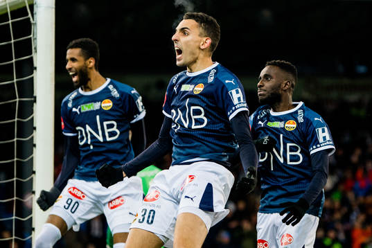 Mustafa "Mos" Abdellaoue of Strømsgodset celebrates with