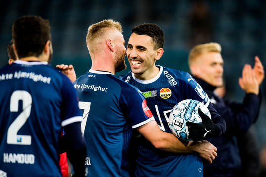 Mustafa "Mos" Abdellaoue of Strømsgodset celebrates