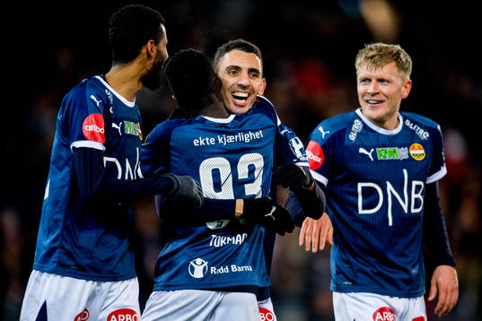 Mustafa "Mos" Abdellaoue of Strømsgodset celebrates with