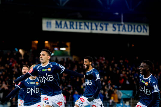 Mustafa "Mos" Abdellaoue of Strømsgodset celebrates with