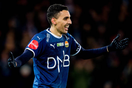 Mustafa "Mos" Abdellaoue of Strømsgodset celebrates