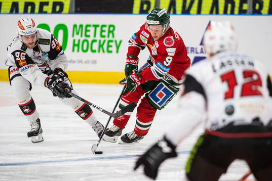 Malmö Redhawks Kim Rosdahl och Frölundas Tim Söderlund i