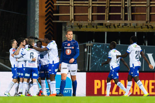 Øyvind Storflor of Ranheim looks dejected while players of