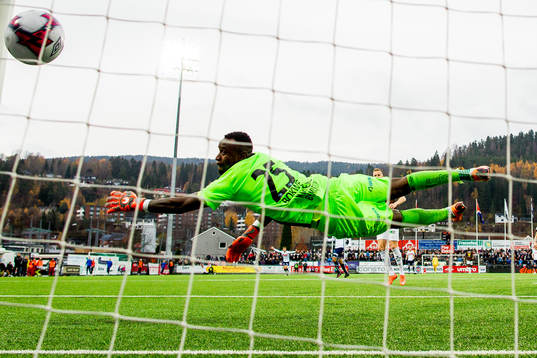Zymer Bytyqi of Viking (hidden) scores the 1-2 goal behind