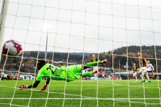 Zymer Bytyqi of Viking scores the 1-2 goal behind