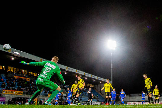 Henrik Robstad of Start scores a disallowed goal behind