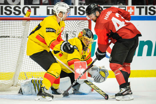 Nichlas Hardt of Malmö Redhawks and goalkeeper Leonardo