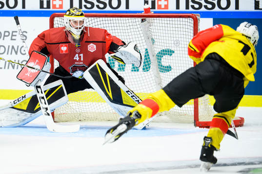 Goalkeeper Lars Volden of Malmö Redhawks and Alain Berger