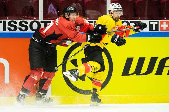 Emil Sylvegård of Malmö Redhawks tackles Mark Arcobello