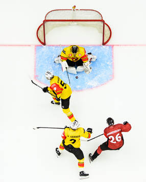 Goalkeeper Leonardo Genoni of Bern saves a shoot from Axel