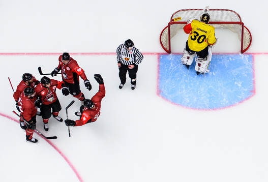 Henrik Hetta of Malmö Redhawks celebrates with team mates