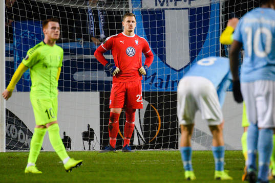 Goalkeeper Johan Dahlin of Malmö FF looks dejected