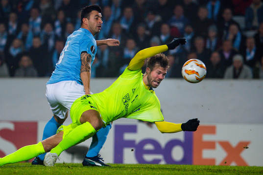 Behrang Safari of Malmö FF and Patrick Mortensen of