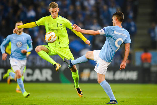 Jon-Helge Tveita of Sarpsborg 08 and Markus Rosenberg of