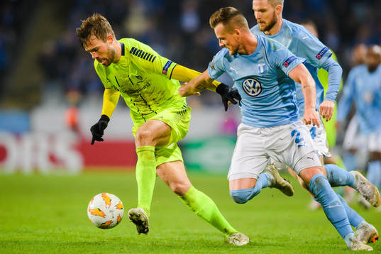 Patrick Mortensen of Sarpsborg 08 and Eric Larsson of
